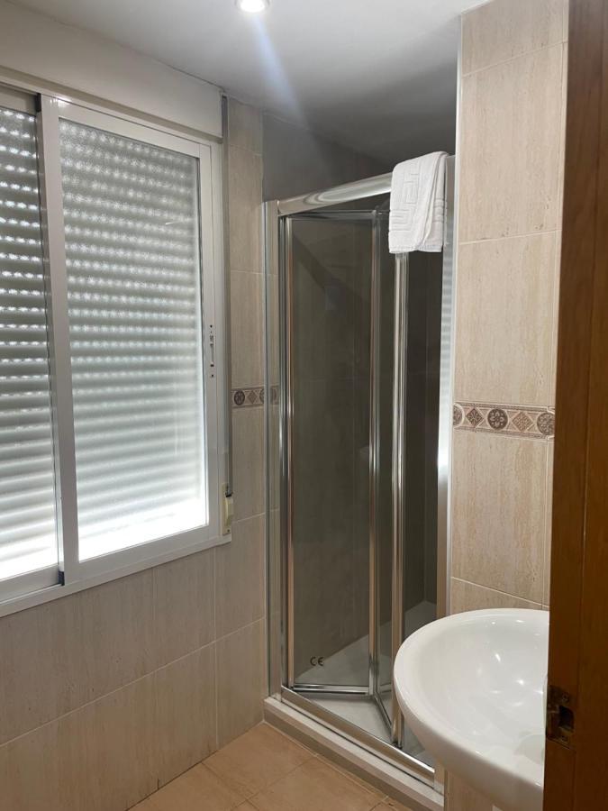 אלצ'ה Hostal Maria מראה חיצוני תמונה A shower enclosure